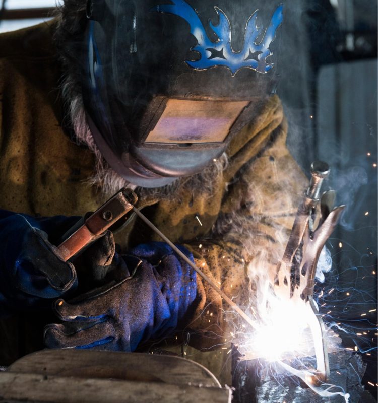 blacksmith-in-welding-mask-welding-metal-in-worksh-2025-04-03-06-15-36-utc (1)