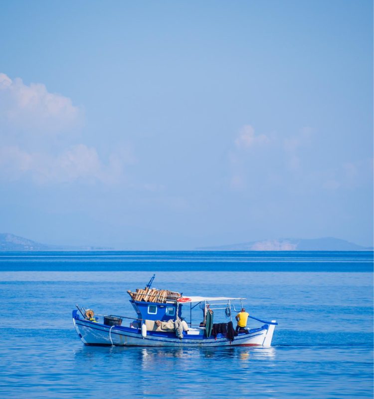 santorini-island-greece-white-boat-2025-02-10-07-42-44-utc (1)